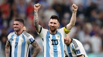 LUSAIL CITY, QATAR - DECEMBER 13: Lionel Messi of Argentina celebrates after the 3-0 win during the FIFA World Cup Qatar 2022 semi final match between Argentina and Croatia at Lusail Stadium on December 13, 2022 in Lusail City, Qatar. (Photo by Clive Brunskill/Getty Images)