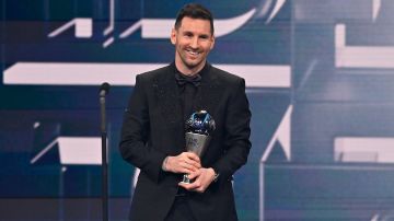 PARIS, FRANCE - FEBRUARY 27: Lionel Messi poses with the Best FIFA Men's Payer 2022 award during The Best FIFA Football Awards 2022 on February 27, 2023 in Paris, France. (Photo by Aurelien Meunier/Getty Images)