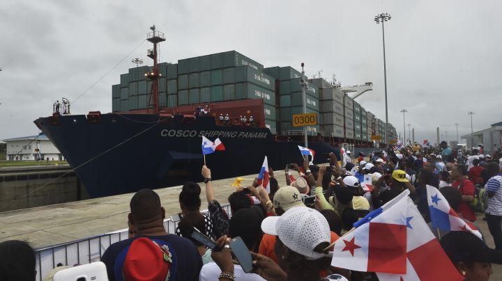 Chinese-chartered merchant ship Cosco Shipping Panama crosses the new Agua Clara Locks during the inauguration of the expansion of the Panama Canal in Colon, 80 km from Panama City on June 26, 2016. A giant Chinese-chartered freighter nudged its way into the expanded Panama Canal on Sunday to mark the completion of nearly a decade of work forecast to boost global trade. / AFP / RODRIGO ARANGUA (Photo credit should read RODRIGO ARANGUA/AFP via Getty Images)